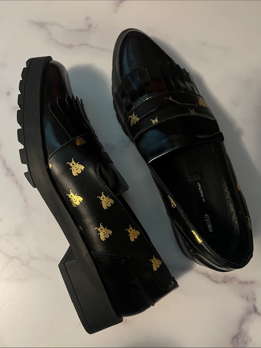 Miista Black Leather Bee-Print Kiltie Loafers